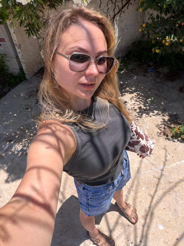 Woman takes sunny selfie in Tel Aviv