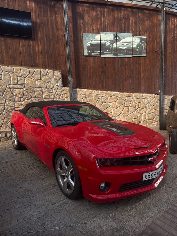 Woman visits vintage car museum in Yalta, Ukraine