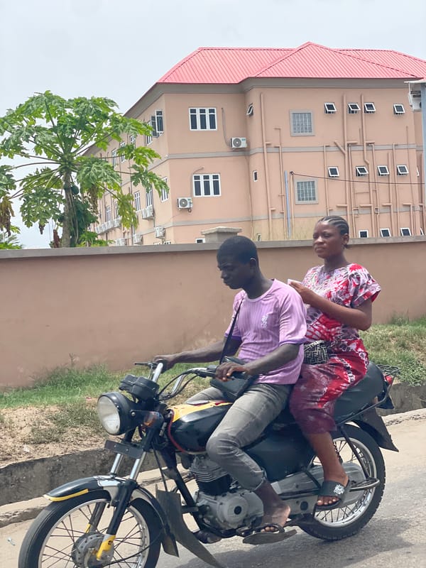 Motorcycle riders spotted on Badagry street near university signage