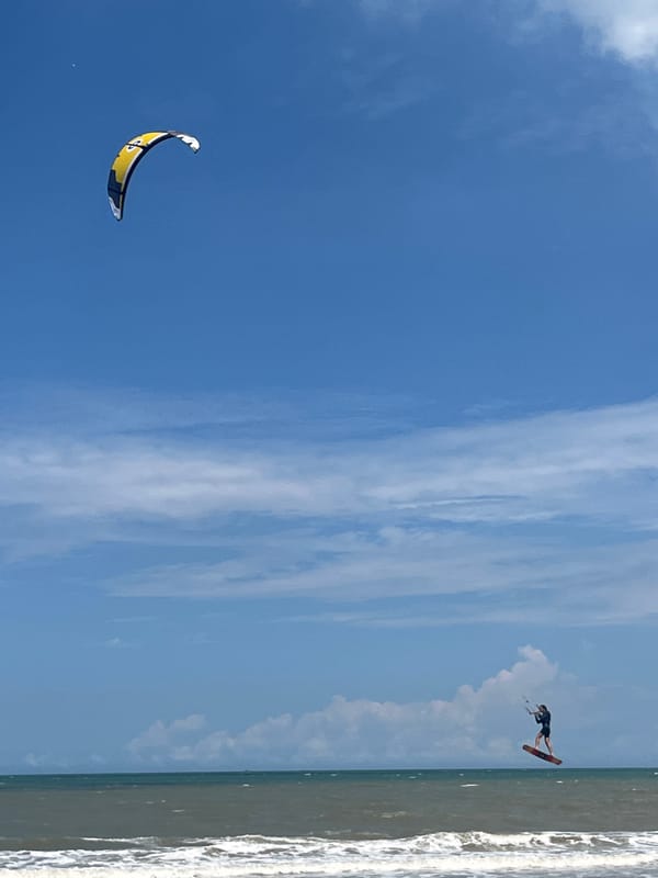 Kitesurfing session on a sunny Phan Thiết beach