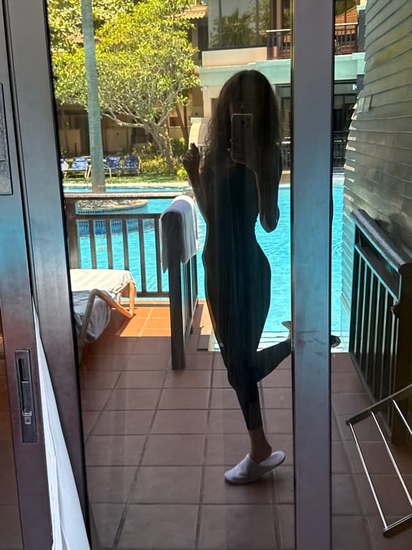 Woman Takes Multiple Mirror Selfies at Dubai Resort Pool