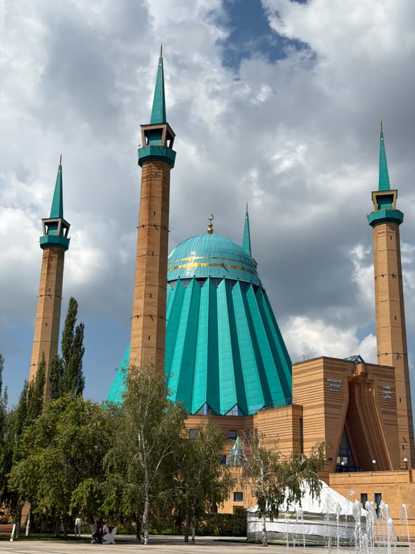 Masyhyr Mosque's teal minarets rise over Pavlodar, Kazakhstan