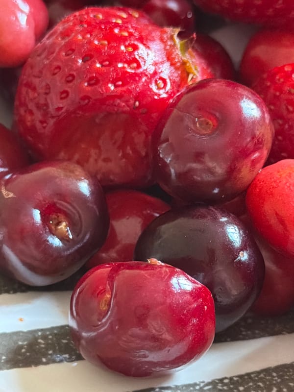 Fresh strawberries and cherries photographed in Catania, Italy