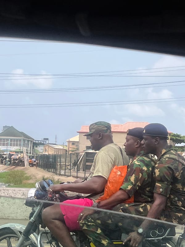 Military personnel spotted riding motorcycle in Igboefon, Nigeria