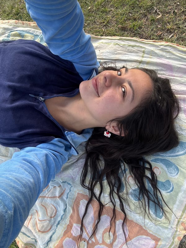 Woman takes relaxed outdoor selfie in Como, Australia