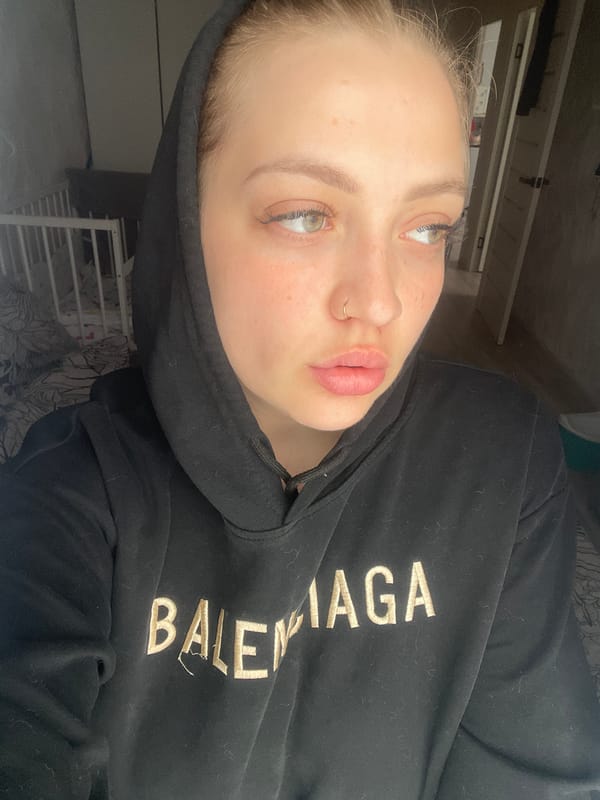 Woman in designer hoodie photographed in Izhevsk, Russia