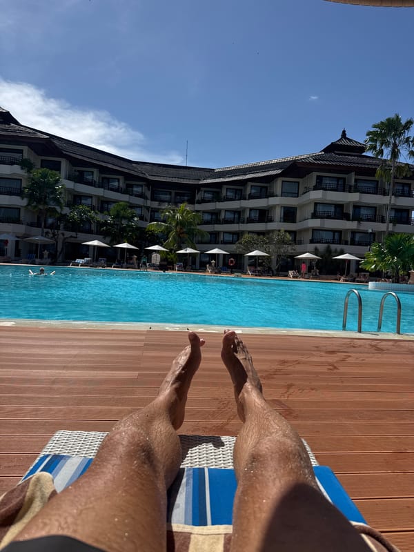 Tourist captures morning poolside moments at Denpasar resort