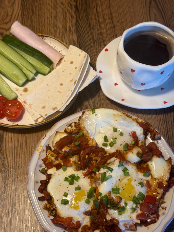 Breakfast spread with shakshuka documented in Perm, Russia