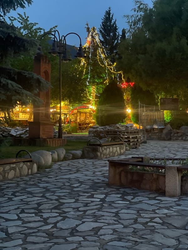 Evening illumination observed at outdoor dining establishment