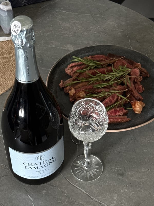 Beef and sparkling wine meal documented in Krasnoyarsk