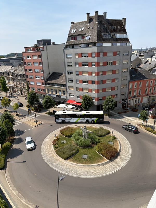 Around a red pedestrian bridge in sunny Esch-sur-Alzette