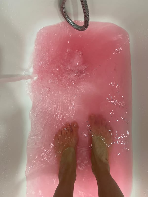 Person takes bath in pink water in Krasnoyarsk