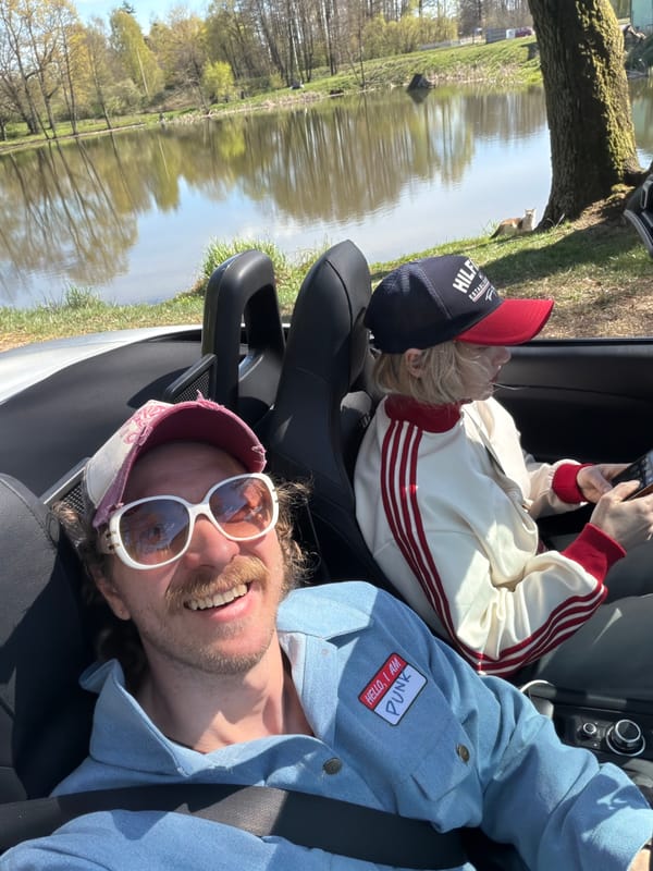 Two people spotted in rural Belarus during sunny midday outing