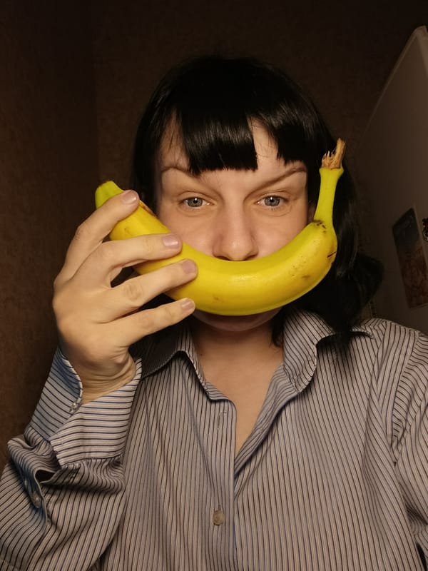 Person stages playful then symbolic silencing sequence in Russia