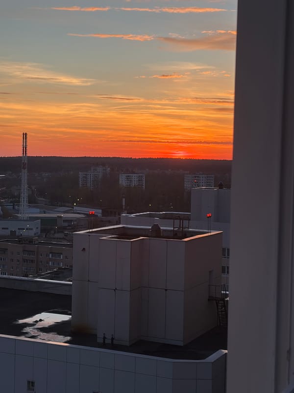Sunset captured from Moscow high-rise building window