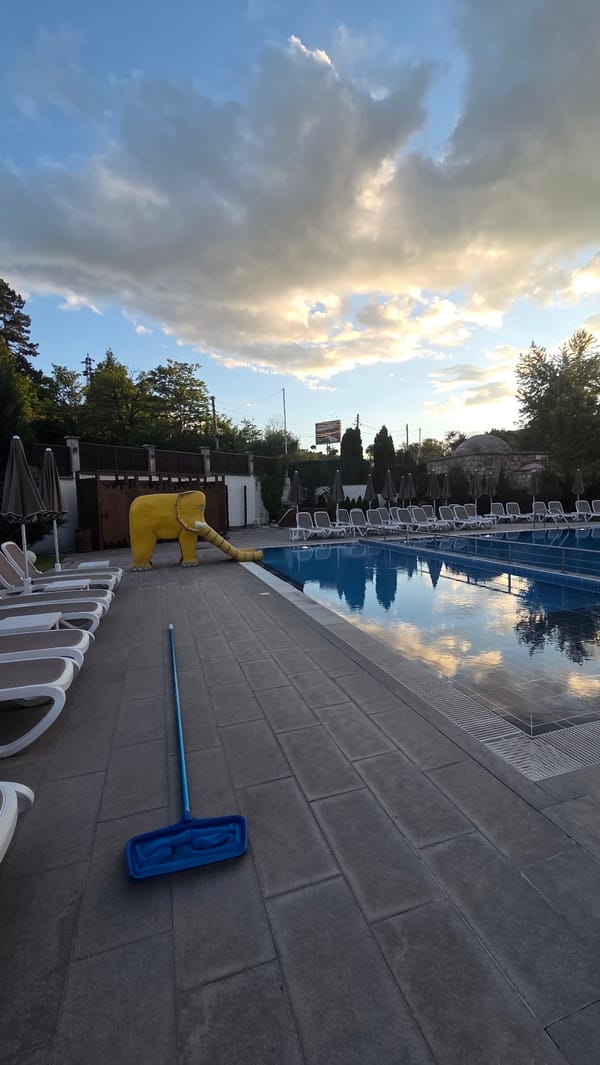 Evening pool area scene in Bania, Bulgaria