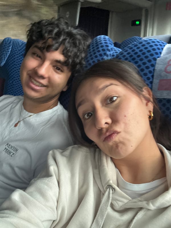 Couple takes playful selfie on public transport in Oaxaca