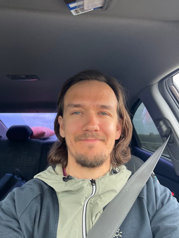 Man observed in vehicle front seat in Niva, Russia