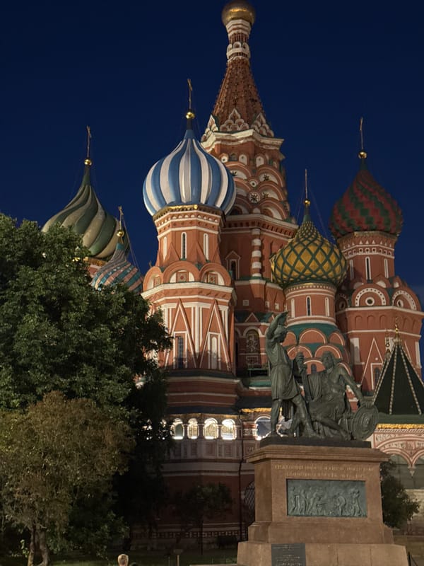 Red Square at night, with a stretch Hummer in the mix