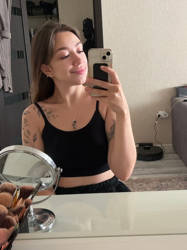 Mirror selfie session in a Chaikovsky bedroom, July 2026