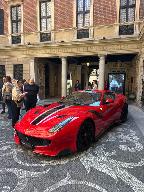 Red Ferrari spotted at historic Milan building