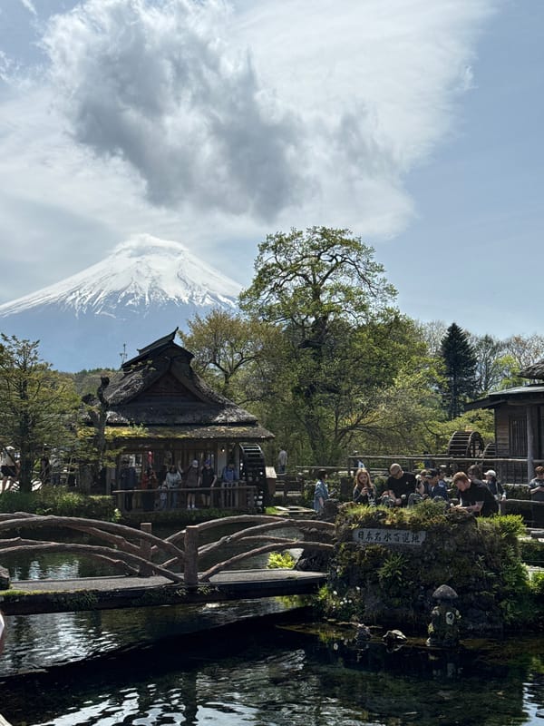 Tourist captures scenic Oshino Hakkai ponds with Mount Fuji backdrop