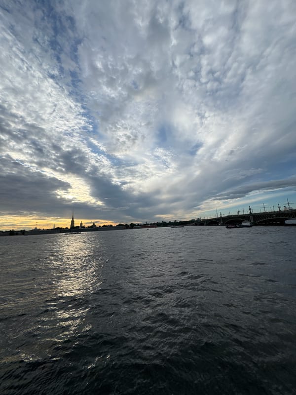 Neva River embankment at golden hour, Saint Petersburg