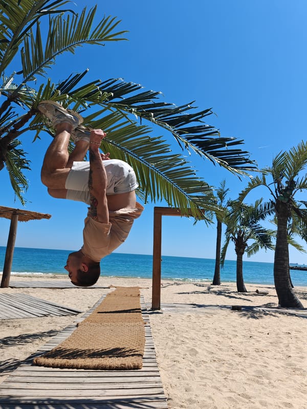 Man performs acrobatic stunts on Varna beach boardwalk