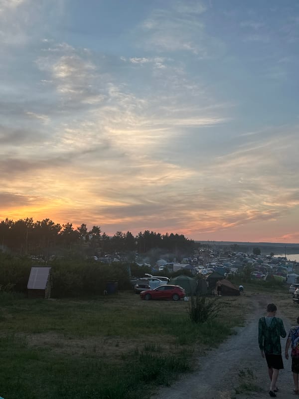 Lakeside campsite gathering at sunset, Zhemchuzhny, Russia