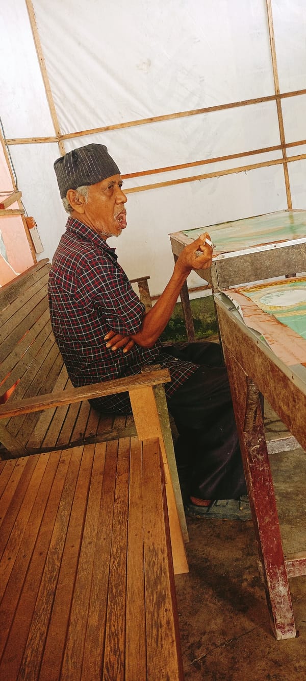 Afternoon hang at a Lhokseumawe café — coffee, cigarettes, phones