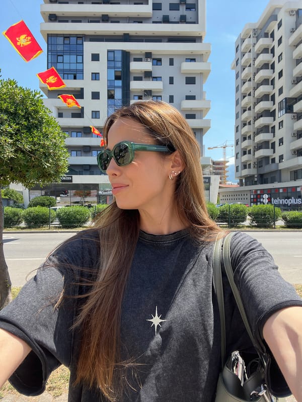 Woman takes selfie outdoors in Bar, Montenegro