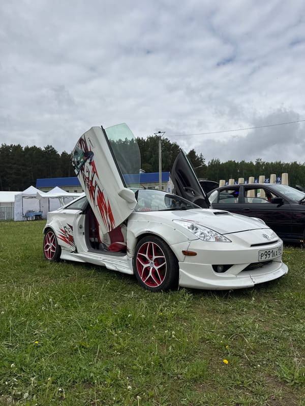 Car enthusiasts gather for automotive show in Chaikovsky, Russia