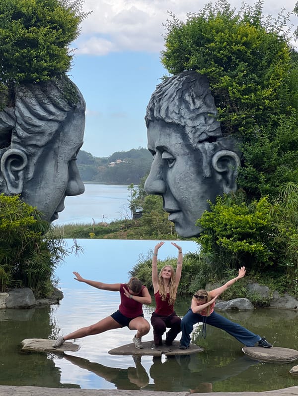 Tourists pose with artistic sculptures at Da Lat attractions
