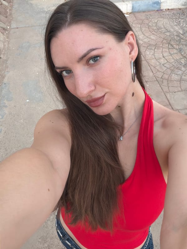 Back-to-back selfies at Sharm El Sheikh, red top, two angles