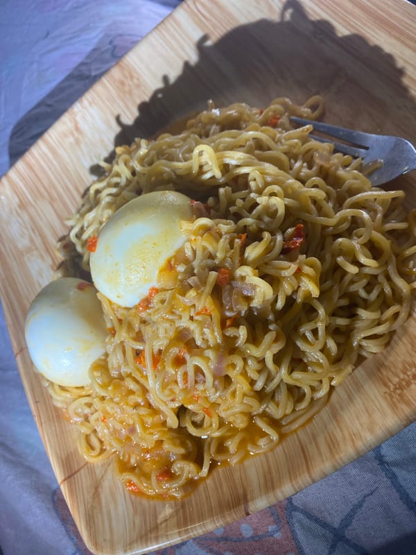 Instant noodles and eggs for a late-night meal in Abuja