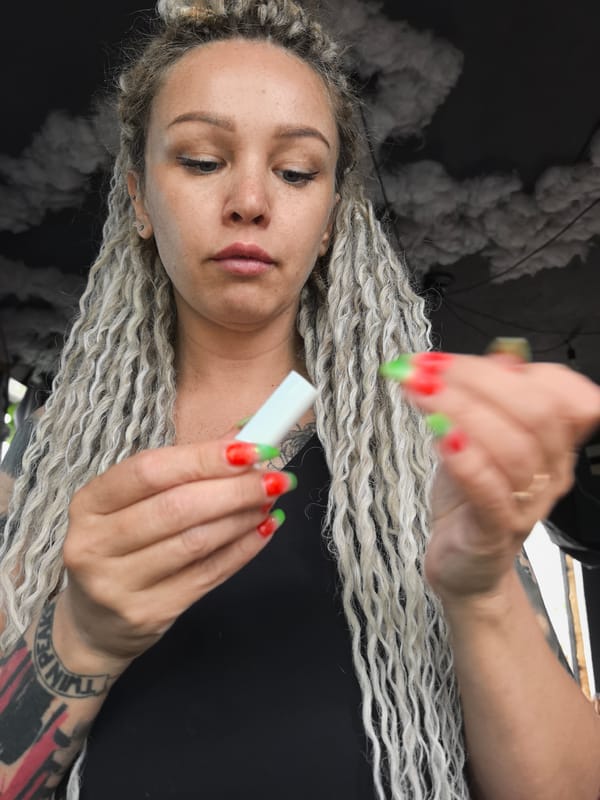 Woman with dreadlocks captured in everyday moments in Noviy