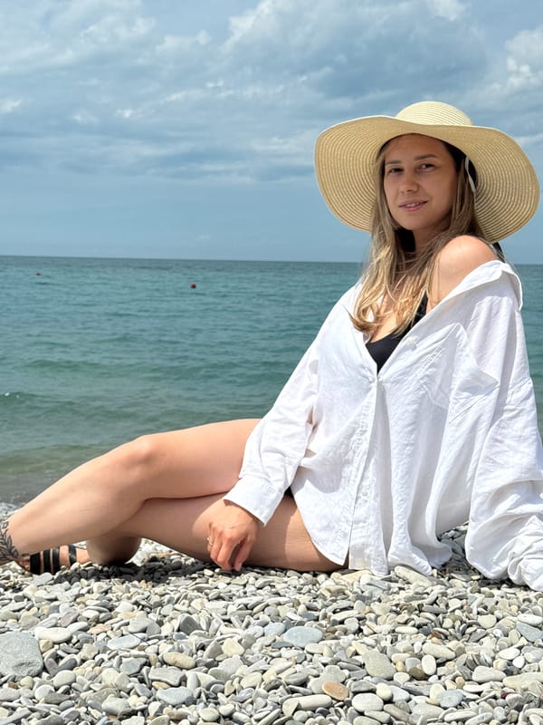 Woman relaxes on Russian beach in morning hours