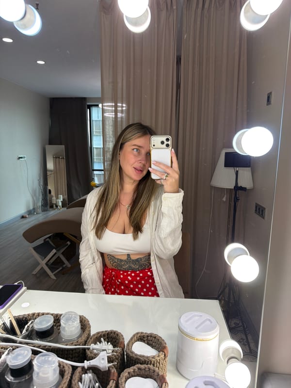Woman takes selfie in Moscow makeup room