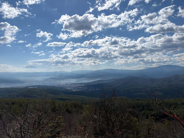 Hiker captures mountain views overlooking Velingrad, Bulgaria