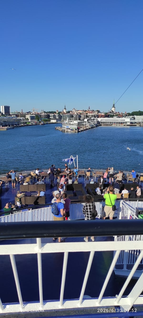Ferry Romantika docked at Tallinn port, passengers boarding and disembarking