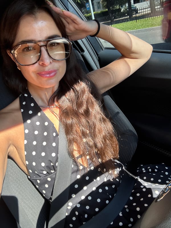 In-car moments with a crane truck and bridge visible outside