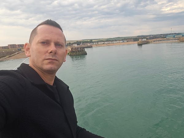 Selfies and fishing on an Adur pier, cloudy afternoon