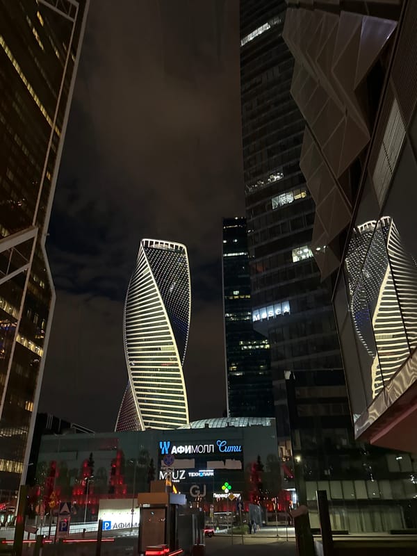 Evolution Tower illuminated at night in Moscow business district