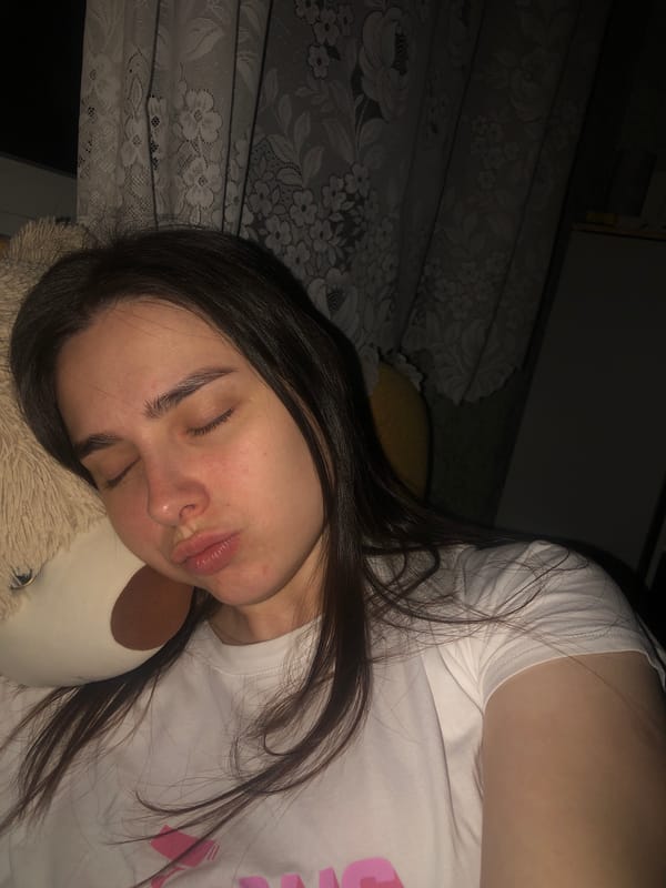 Woman sleeps with stuffed animal in Noviy, Russia