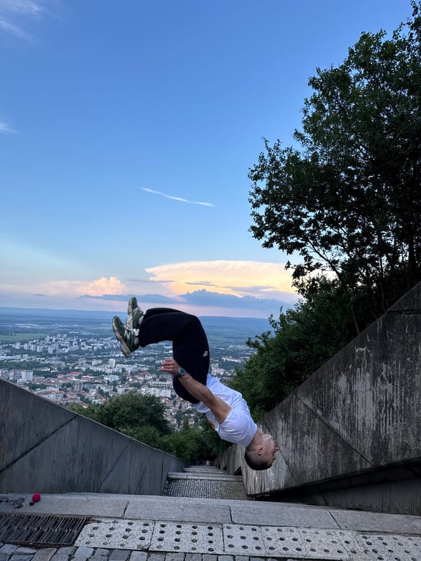 Parkour performer executes backflips, poses with crafts in Shumen