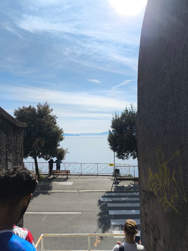 Urban passageway view captured overlooking water body