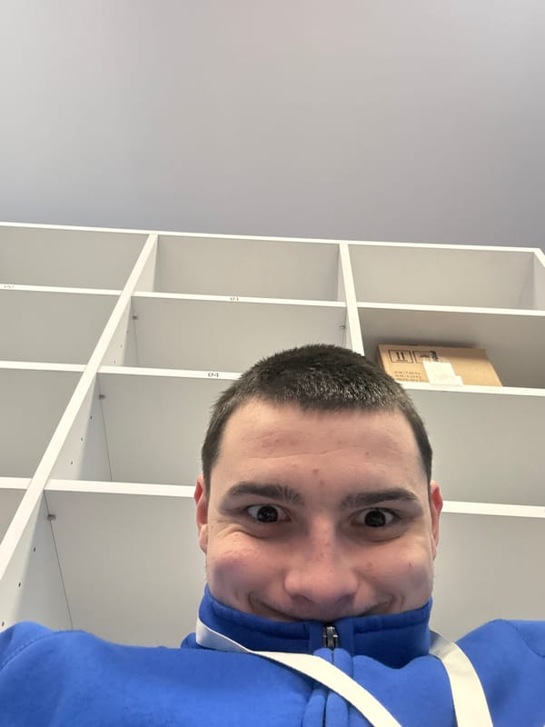 Man Takes Morning Selfie Near Shelves in Sofia