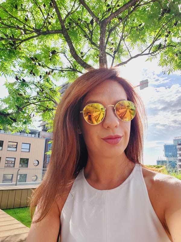 Selfie series in Sofia, sunglasses mirroring the city around