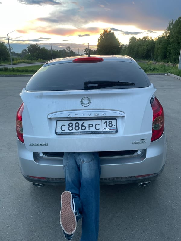 Couple documents evening car trip in Votkinsk, Russia
