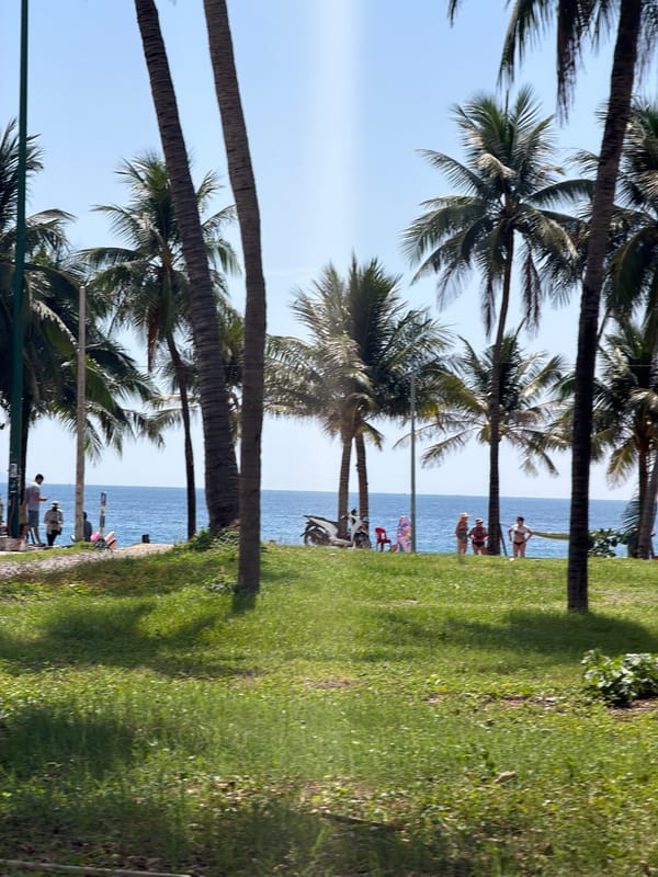 Tourist documents sunny beach day in Nha Trang, Vietnam